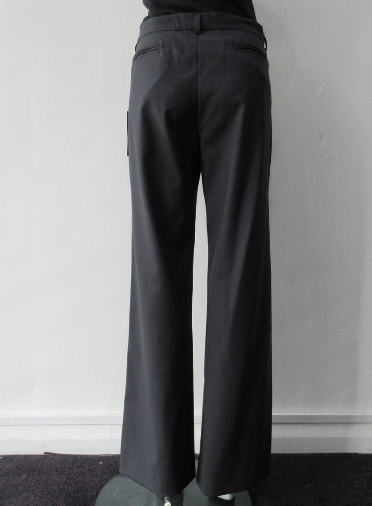 Charcoal grey wool trousers with side welt pockets. Size 8. 100% Wool Dry Clean Only. Inseam 80cm, Outseam 105cm
