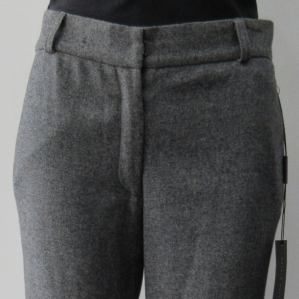 Soft wool trouser with relaxed fit. Size 8, Inseam 88.5cm, Outseam 108cm, 100% Wool, Dry Clean Only. Made in Croatia