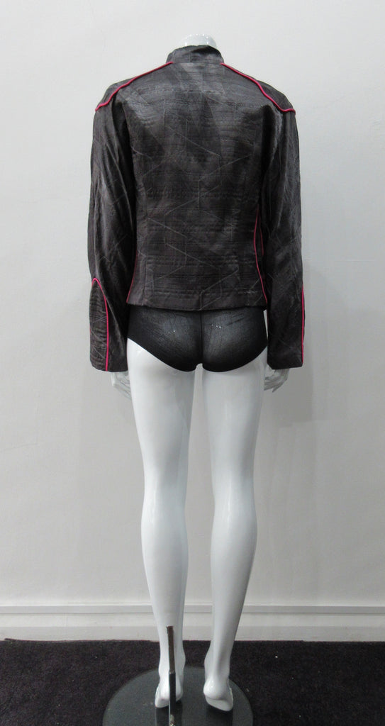 Side Zip Jacket. Assymetrical side front zip jacket featuring abstract stitching incorporated into the fabric for a geometric feel. Rich deep grey colour with pink piping accents on shoulder and sleeve panels. Fully lined. CB length 53cm. Sleeve length from side neck point 75cm. 400g approximate weight. 29% Nylon, 22% Viscose, 28% Cotton, 12% Linen, 2% Polyester. Lining: 100% Rayon. Dry Clean Only. Made in Canada