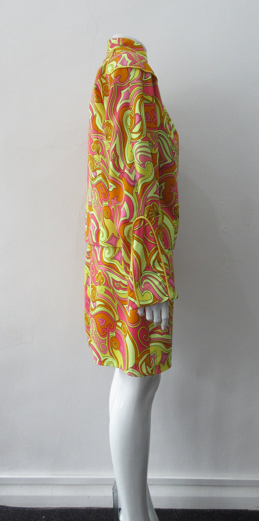 Bright Yellow Print Jacket. Bright loose fitting zippered jacket with 60's style yellow, pink and orange design. Chinese style piping trim accent in yellow satin piping. Fully lined. 100% Viscose. Lining: 100% Rayon, Dry Clean Only. Made in Canada, 240g approximate weight