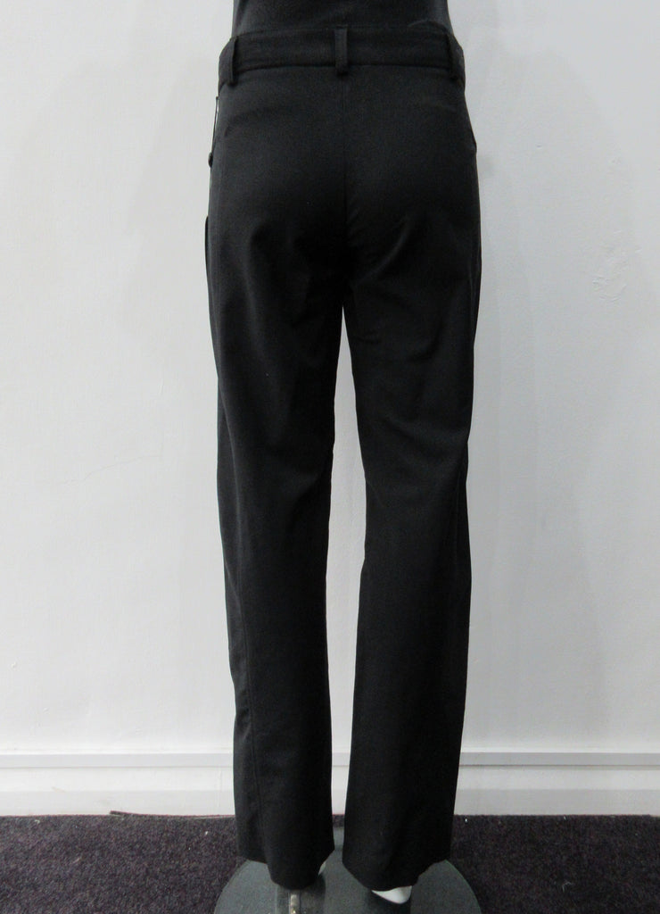 Fully tailored black slightly stretch trouser. Low-cut waist with side pockets above paneled seam. Size 8. Inseam 81.5cm, Outseam 100cm