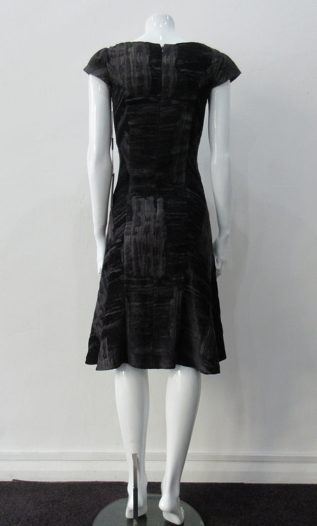Sided Dress. A classic look with front piece with cross-cut side panels. Charcoal grey and black satin & velvet combination with cap sleeves. CB zipper fully lined
