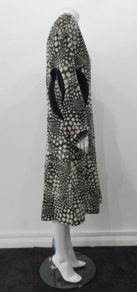 090119 Side Sport Panel Dress Gentle swing dress in abstract black & white mod textile design with black solid panels on sides and under scooped neckline.