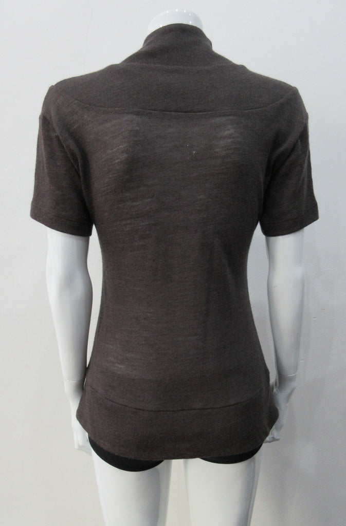 T-Shirt style with short sleeves featuring curved panel parallel to neckline and soft dropped round collar. Soft wool fine knit in rich brown colour. Size 8