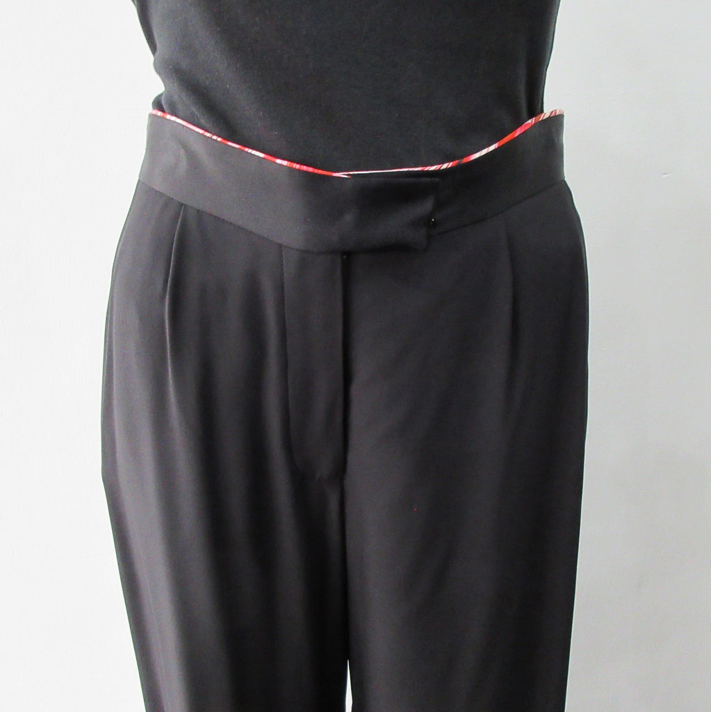 Soft flowing flared trouser with inside cntrast waistband trim. Black colour. Size 10 Inseam 81.5cm, Outseam 106cm, 100% Polyester Contrast: 100% Silk, Dry Clean Only, 240g approximate weight. Made in England