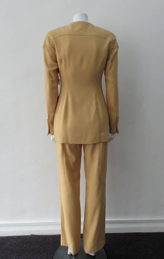 Abstract geometric cut with shoulder and hem design detail in deep maize/mustard colour. CF zipper and fully lined. Size 8, 63% Polyester, 37% Linen Lining: 100% Rayon, Dry Clean Only, Made in Canada