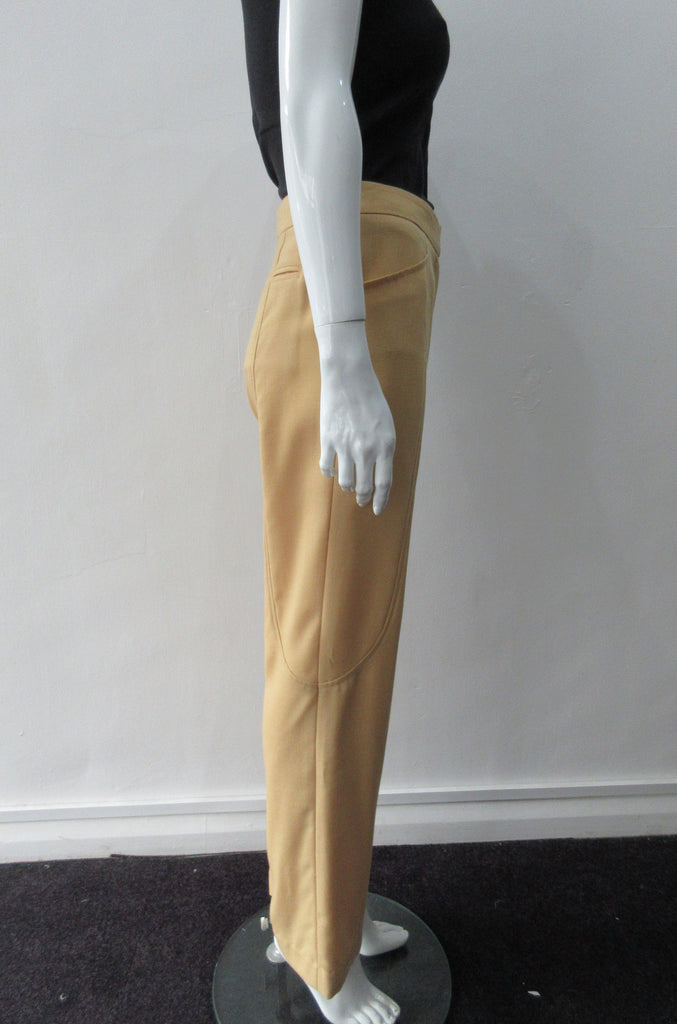 Abstract geometric cut with curved panel designs in deep mustard colour. CF zipper and partially lined. Size 8, Inseam 70cm, Outseam 97.5cm, 63% Polyester, 37% Linen, Lining: 100% Rayon, Dry Clean Only