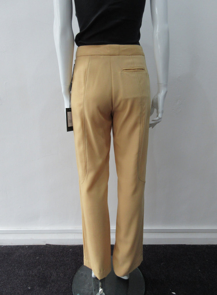 Abstract geometric cut with curved panel designs in deep mustard colour. CF zipper and partially lined. Size 8, Inseam 70cm, Outseam 97.5cm, 63% Polyester, 37% Linen, Lining: 100% Rayon, Dry Clean Only