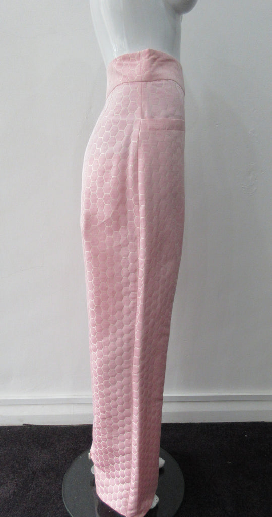 Pink Module Trouser. Pink coral semi-tailored straight leg trouser with beige hexagon textile deisgn. Featuring a relaxed fit and side zipper and front pockets. Extra long legs for the taller woman; can also be shortened to size. Inseam 90cm, Outseam 115cm. 230g approximate weight. 79% Polyester, 21% Linen. Dry Clean Only. Made in England