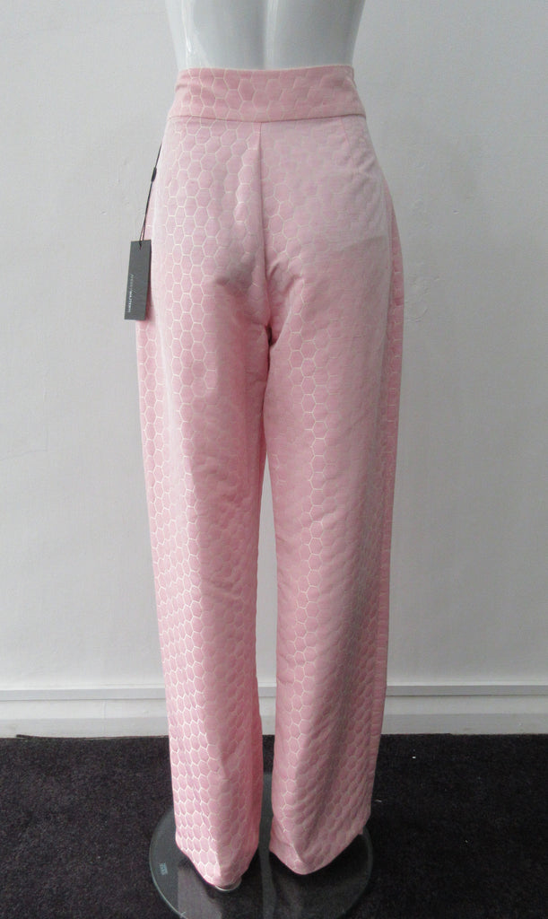 Pink Module Trouser. Pink coral semi-tailored straight leg trouser with beige hexagon textile deisgn. Featuring a relaxed fit and side zipper and front pockets. Extra long legs for the taller woman; can also be shortened to size. Inseam 90cm, Outseam 115cm. 230g approximate weight. 79% Polyester, 21% Linen. Dry Clean Only. Made in England