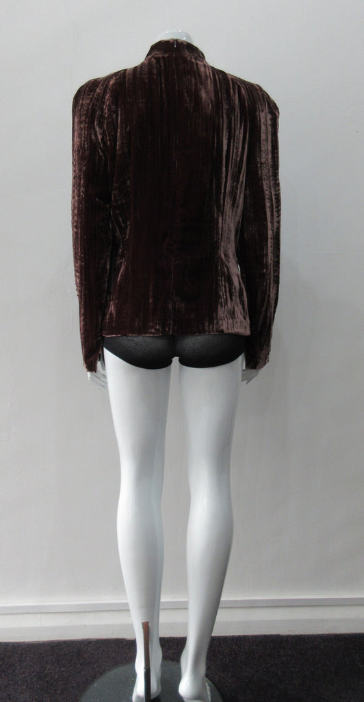 Gathered Top. Rich long sleeve top in deep red-grey streaked velvet. Panel details under bustline to accentuate fit. CB zip and 4.5cm wide collar. Fully lined. CB length from neckpoint 60cm, sleeve length 79cm from side neck point. 450g approximate weight. 75% Viscose, 25% Nylon. Lining 100% Rayon. Dry Clean Only. Made in England