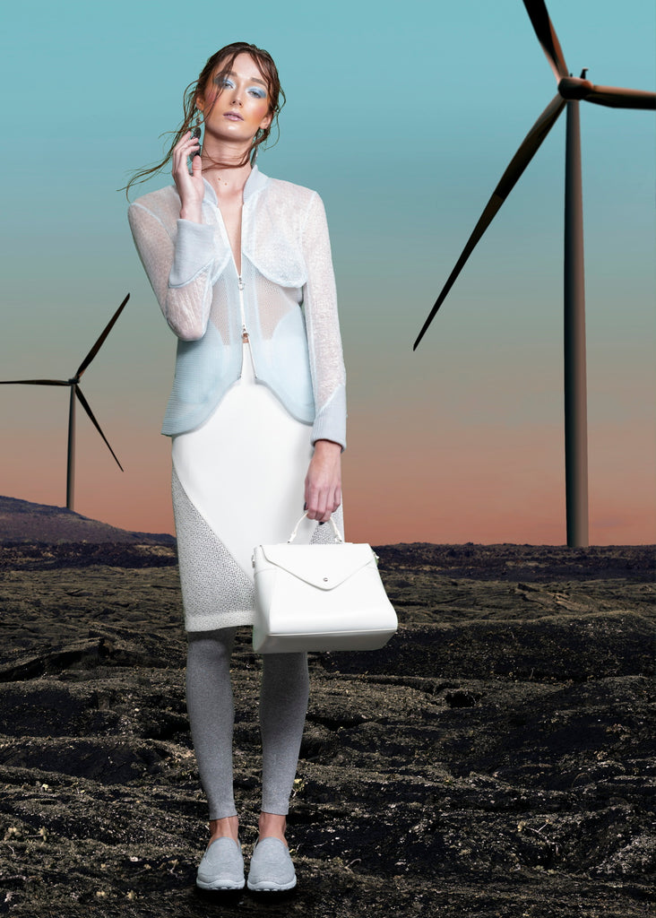 Bust Jacket. Active Zip Jacket in sea green mesh with contrast bubble like sheer crispy fabric paneling, also in sea green. Knit collar and side sleeve hem panel. Double CF zipper.