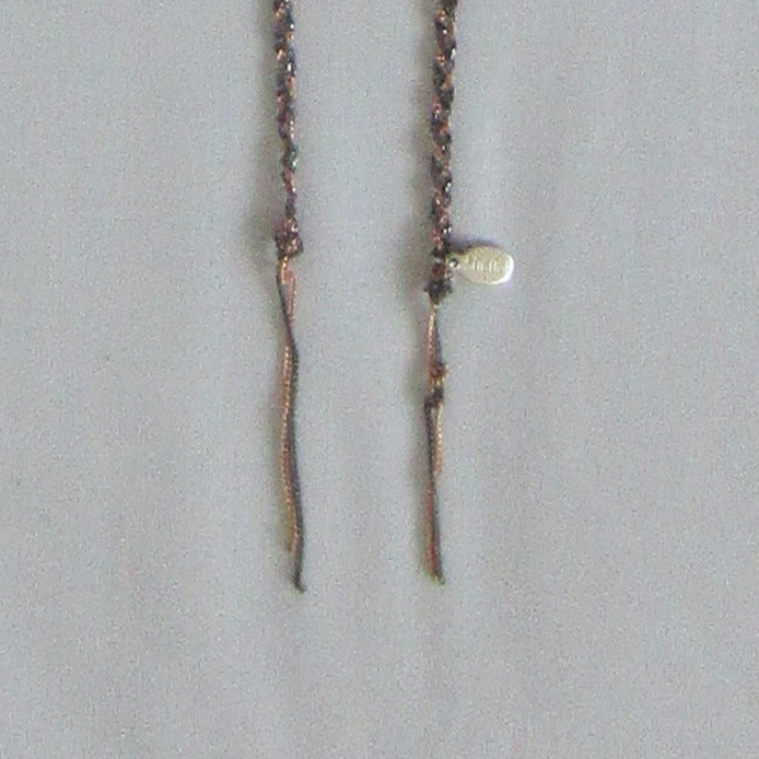 Sogoli gold yellow colour tassle necklace close-up image photo picture