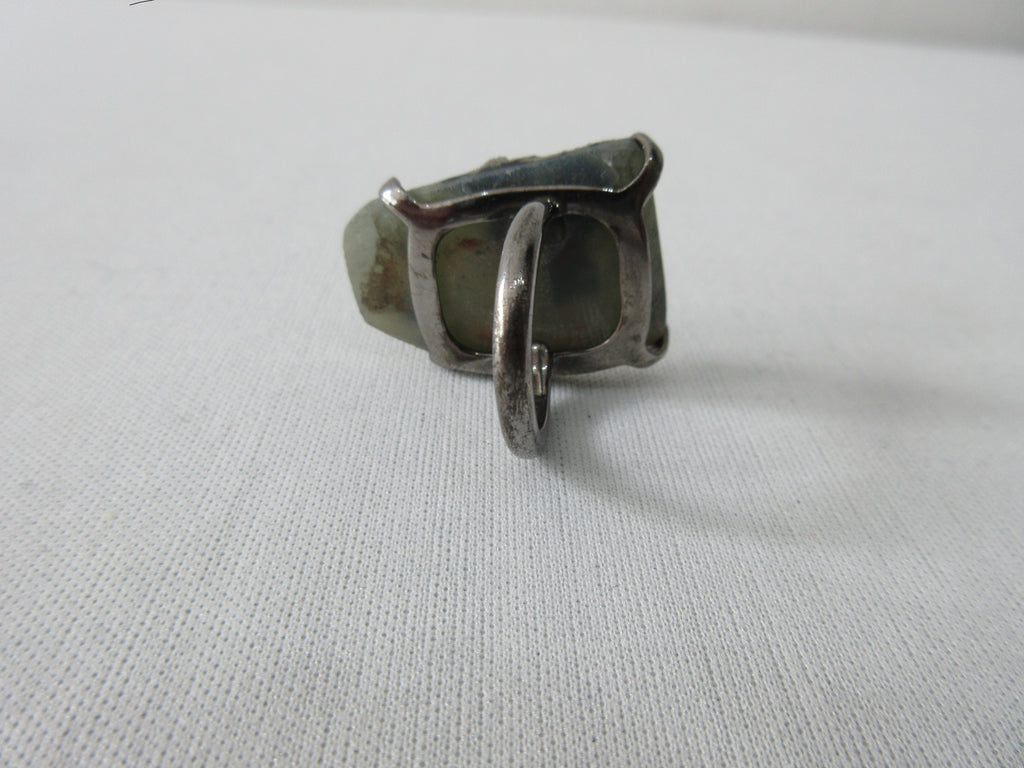 Slightly sparkly crystal with 5 highlited textured enlargements. Unknown crystal. Inside ring diameter 1.7cm. Top ring crystsl measures 3cm x 2.2cm tapering