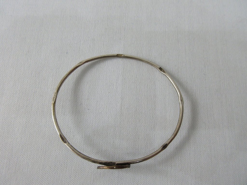 Karyn Chopik Attached Coin Bracelet, Item Number: S1115, Sterling Silver, Antiquated Brass, Size L -Inside Diameter 6.8cm, 40g approximate weight, Made in Canada