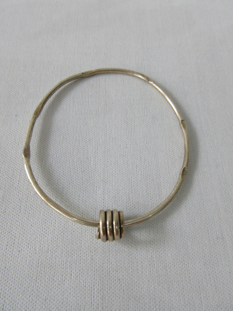 Karen Chopik Fused Quad Ring Bracelet, Sterling Silver, Product Number: 5821, Size M, 6.5cm inside diameter, 45g approximate weight, Made in Canada
