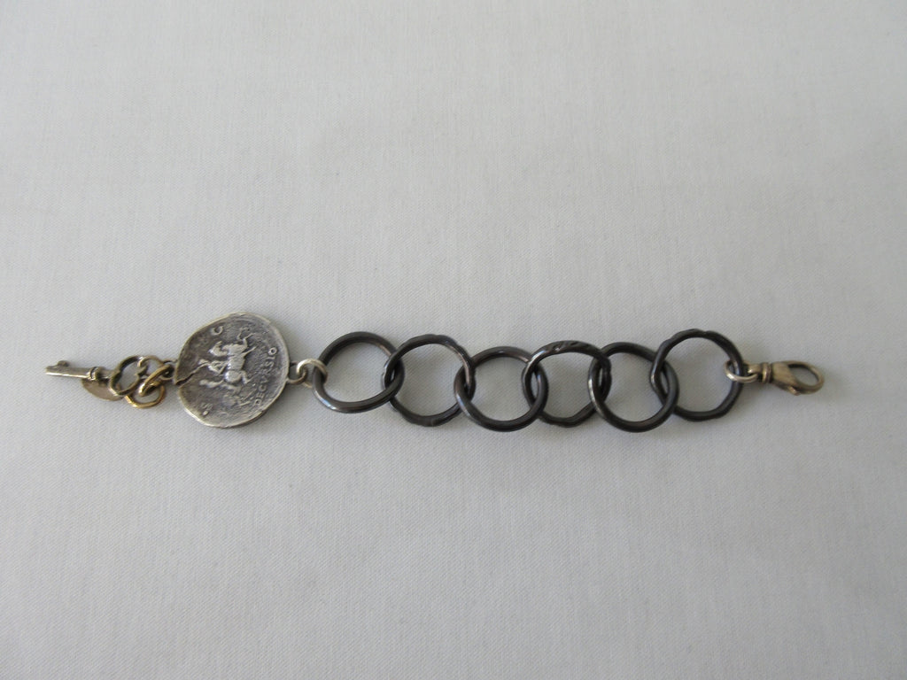 20A49 -Karyn Chopik 6 Ring Coin & Key Bracelet