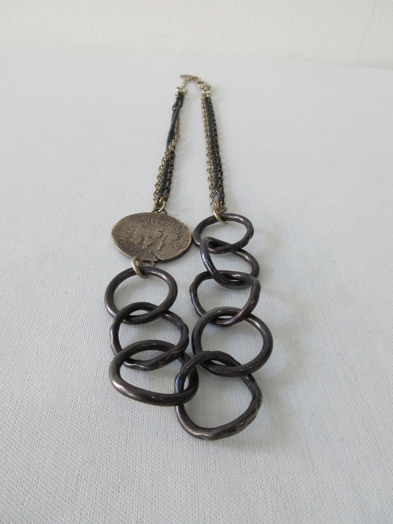 20A50 -Karyn Chopik 8 Ring & Coin Necklace
