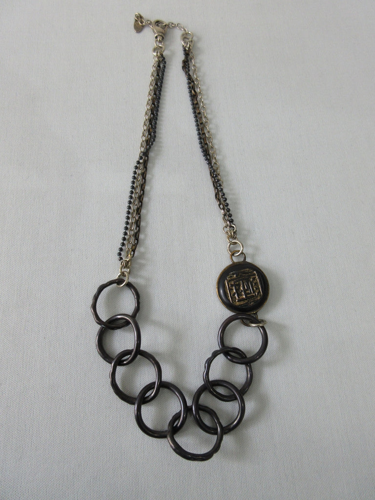 Karyn Chopik 8 Ring & Medallion Necklace with multi-chain combo. Item Number N1166, Sterling Silver with Antiquated Brass, Copper, 54cm full length open, 28.5cm maximum length when worn, Made in Canada