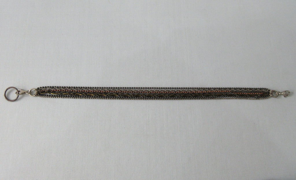 Karyn Chopik Multi Chain Choker, Sterling Silver, Antiquated Brass, Copper. 7 sets of chains. Open length 39cm, 80 grams approximate weight. Made in Canada