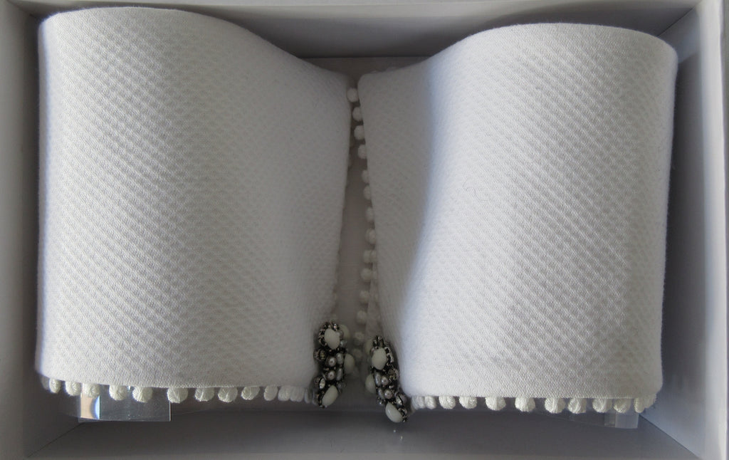 Catherine Osti White Cotton Pique Cuffs. 100% Cotton. Small pleats approximately 3-4mm width. Snap Closure. 19.5cm width snap to snap. 60g approximate weight, comes in white box. Made in France £155.00