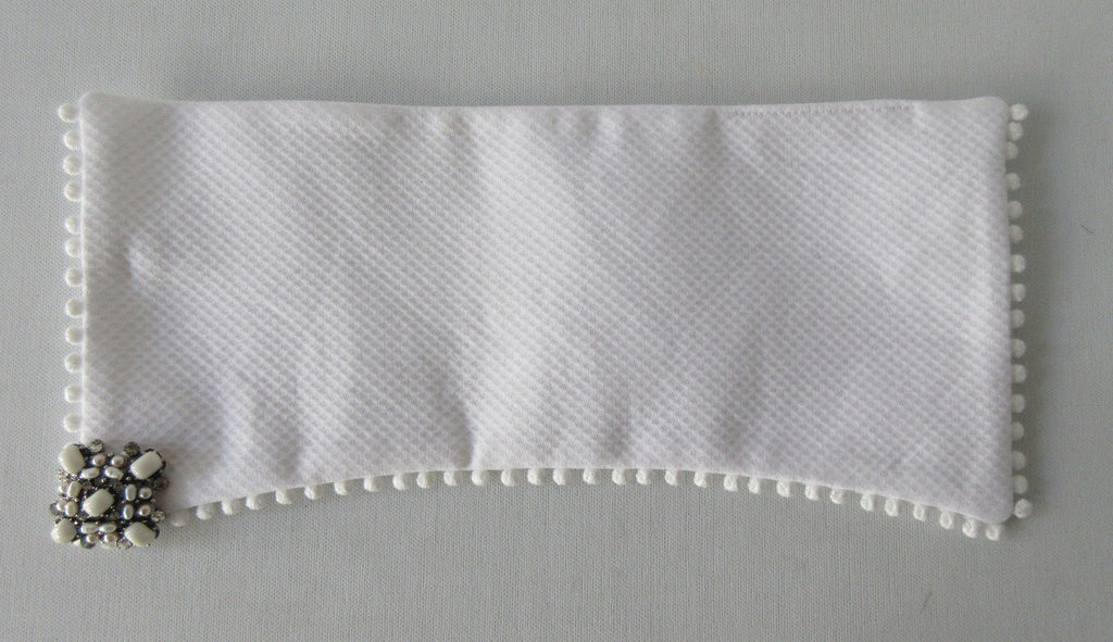 Catherine Osti White Cotton Pique Cuffs. 100% Cotton. Small pleats approximately 3-4mm width. Snap Closure. 19.5cm width snap to snap. 60g approximate weight, comes in white box. Made in France £155.00