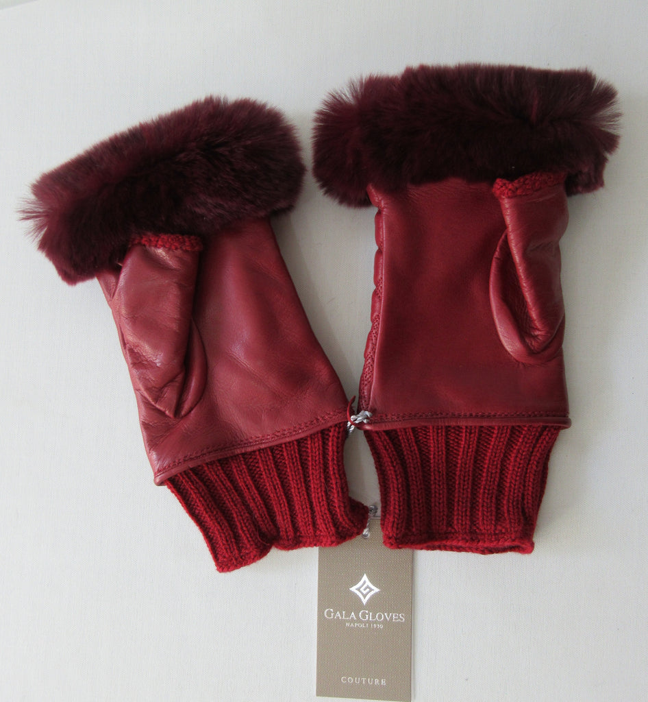 Gala Gloves Couture Red Fingerless Gloves, Item Number D596NALAD261RUB 948.010. Ruby Red coloured textured leather with knit base, leather fingerless glove with fur trim for fingers. Fur unknown. 80g approximate weight. Made in Italy