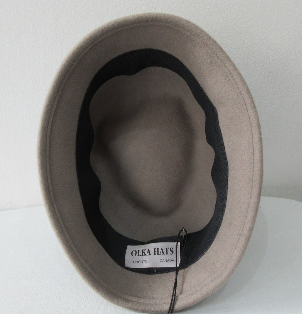 Olka Taupe Hat taupe colour felt with grey/black wrap around sash trim on brim. Size unknown, 57.5cm circumference. Height 12.5cm, Length 26.5cm, width 16.5cm. 26g approximate weight. 100% Wool. Made in Canada.