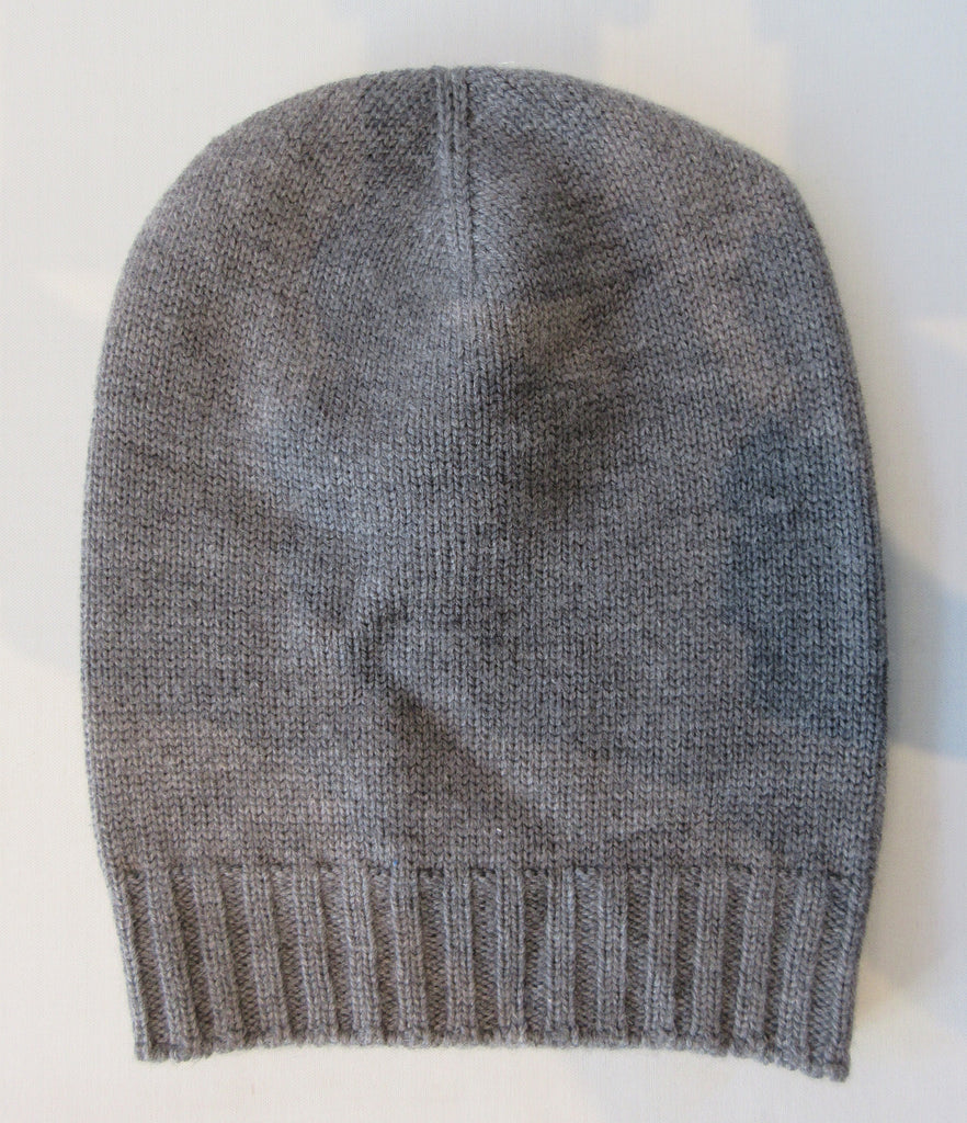 Regina Grey Silver Crystal Hat. Knit Cap in Medium Grey with silver mini Swarowski crystals on front. Crystals can be displayed full front or worn sideways. Article 90733 Fumo TG A/M. Width 22cm, Height 21cm. 50g approximate weight. 100% Wool Hand wash, Hang dry only. Made in Italy