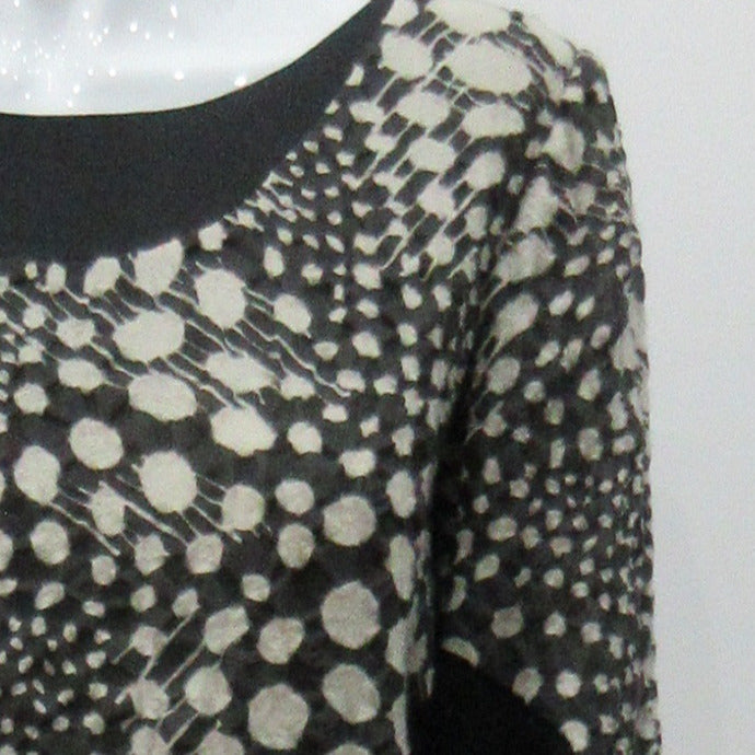 090119 Side Sport Panel Dress Gentle swing dress in abstract black & white mod textile design with black solid panels on sides and under scooped neckline.