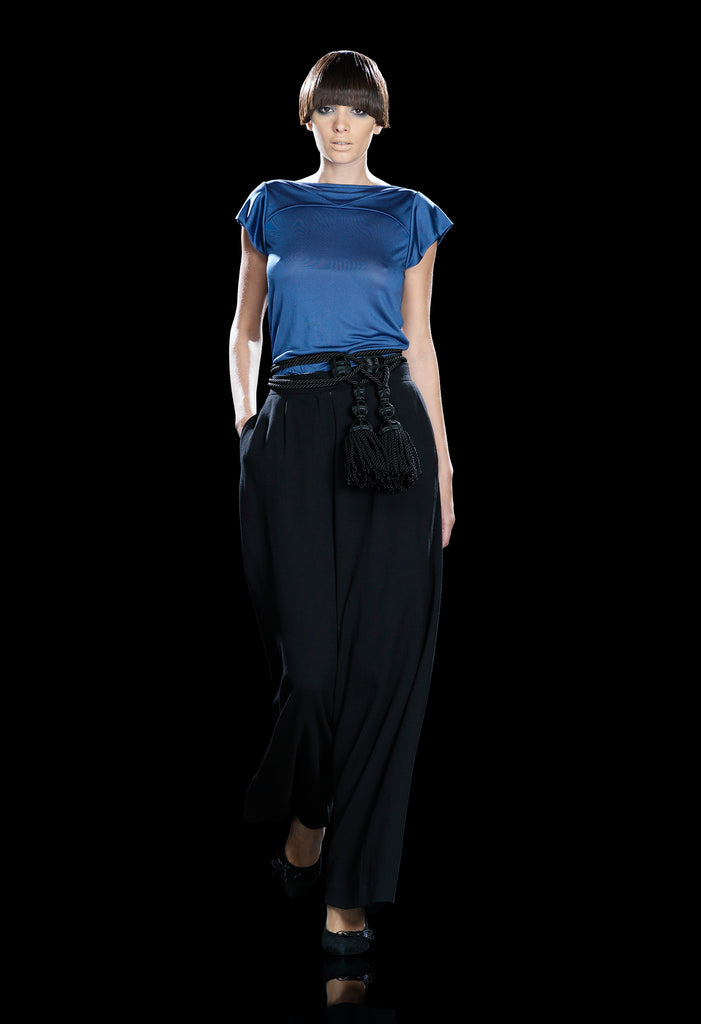 Soft flowing flared trouser with inside cntrast waistband trim. Black colour. Size 10 Inseam 81.5cm, Outseam 106cm, 100% Polyester Contrast: 100% Silk, Dry Clean Only, 240g approximate weight. Made in England