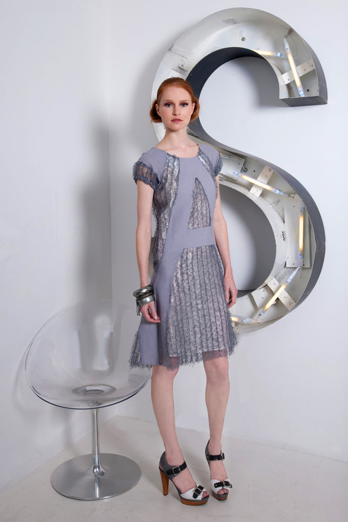 A Dress, Blue-Grey A-line dress with custom built textured netting panels. 65% Linen, 35% Cotton. Contrast: 98% Polyamide, 2% Polyester Lining: 100% Rayon. Dry Clean Only. 250g approximate weight. Made in Croatia