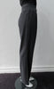 Fully tailored wool trouser with front single pleats.  Deep charcoal colour. Paritally lined to mid-leg. Inseam 82cm, Outseam 100cm 100% Wool Lining: 100% Rayon Dry Clean Only