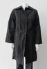 Pinched fabric Coat with white stitching creating striped effect. CB pleat for greater ease. Large covered buttons and front welt pockets. CB Length 94cm, 62% Nylon, 36% Cotton, 2% Polyester, Lining: 100% Rayon, Made in Canada