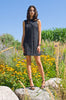 Black Flap Shoulder Dress. The ideal little black sleevelss dress featuring assymetric styling with piping. CB invisible zipper. Fully lined. Size 8