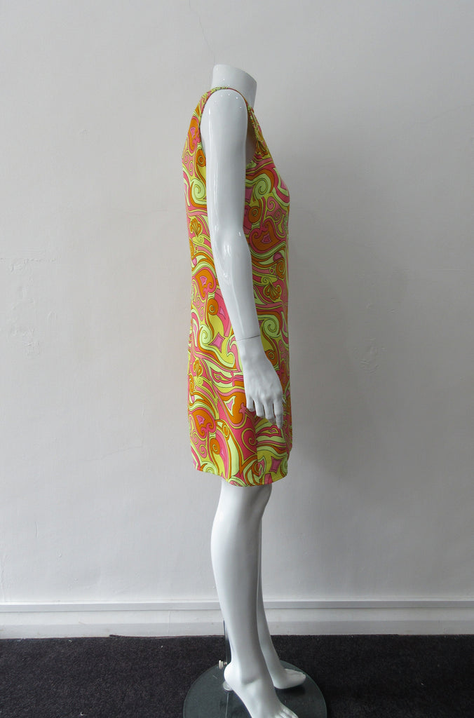 Bright Yellow Print Dress. Below the knee dress with 60's style yellow, pink and orange design. Chinese style piping trim accent in yellow satin piping. CB zipper. Fully lined.