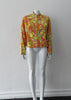 Bright Yellow Print Jacket. Bright loose fitting zippered jacket with 60's style yellow, pink and orange design. Chinese style piping trim accent in yellow satin piping.  Fully lined. 100% Viscose. Lining: 100% Rayon, Dry Clean Only. Made in Canada, 240g approximate weight