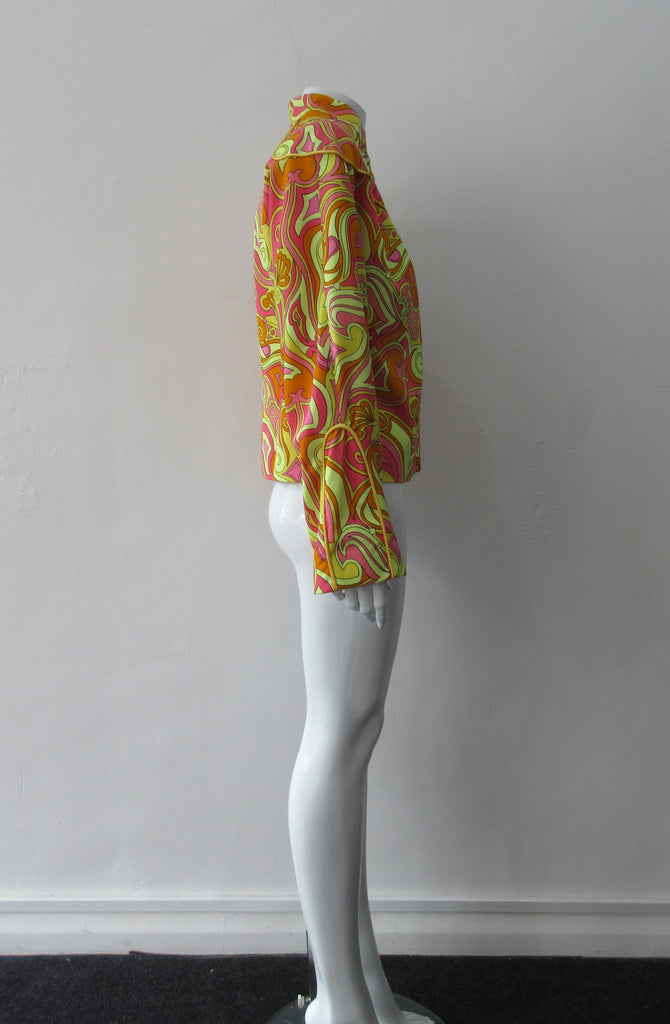 Bright Yellow Print Jacket. Bright loose fitting zippered jacket with 60's style yellow, pink and orange design. Chinese style piping trim accent in yellow satin piping.  Fully lined. 100% Viscose. Lining: 100% Rayon, Dry Clean Only. Made in Canada, 240g approximate weight