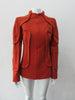 Trench Panel style Jacket in Deep Carrot Orange colour.  Panel design on shoulders and side waist in Deep Carrot Orange colour. Geoetric thread design becomes more fuzzy with aging, natural process and part of the design. CF zipper. 65cm approximate length. 600g approximate weight. Size 6, 80% Wool, 20% Nylon Lining: 100% Rayon Dry Clean Only. Made in Croatia