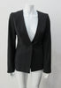 Collarless jacket featuring faux collar details with an overall tailored feel, in dark greyish brown colour. Fabric has very fine stripes. Covered buttons throughout with 1 button CF closure.