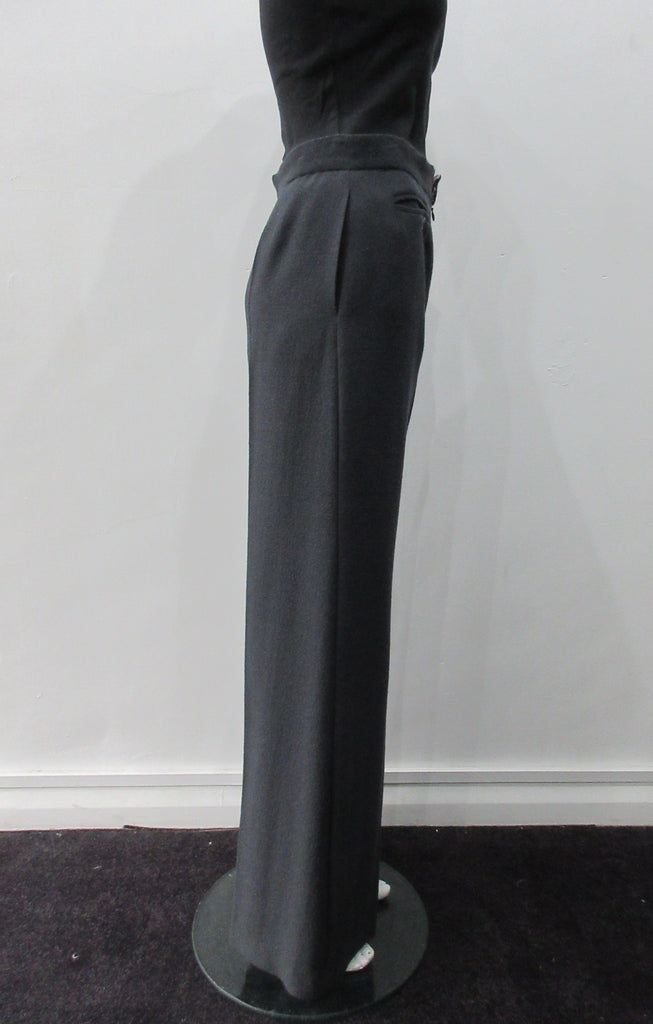 110112 Tailored Touser. Deep Grey Wool Crepe flowing with flared hem, Reverse pocket details on front. Size 8, Inseam 85cm, Outseam 106cm, 100% Wool, Contrast: 100% Cotton, Lining: 100% Rayon, Made in England