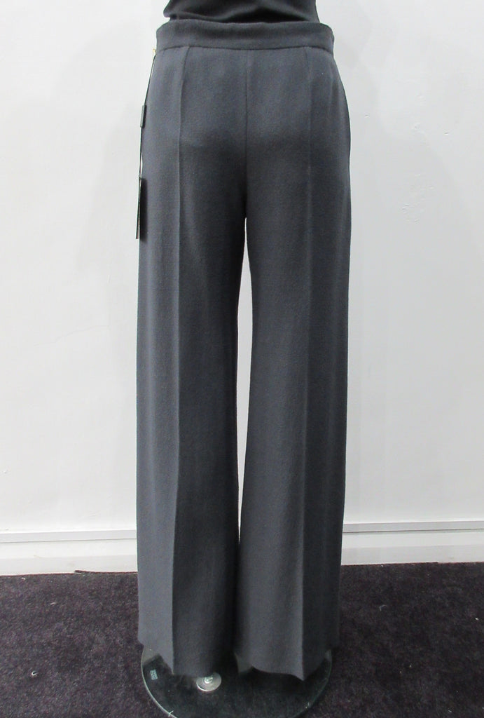 110112 Tailored Touser. Deep Grey Wool Crepe flowing with flared hem, Reverse pocket details on front. Size 8, Inseam 85cm, Outseam 106cm, 100% Wool, Contrast: 100% Cotton, Lining: 100% Rayon, Made in England