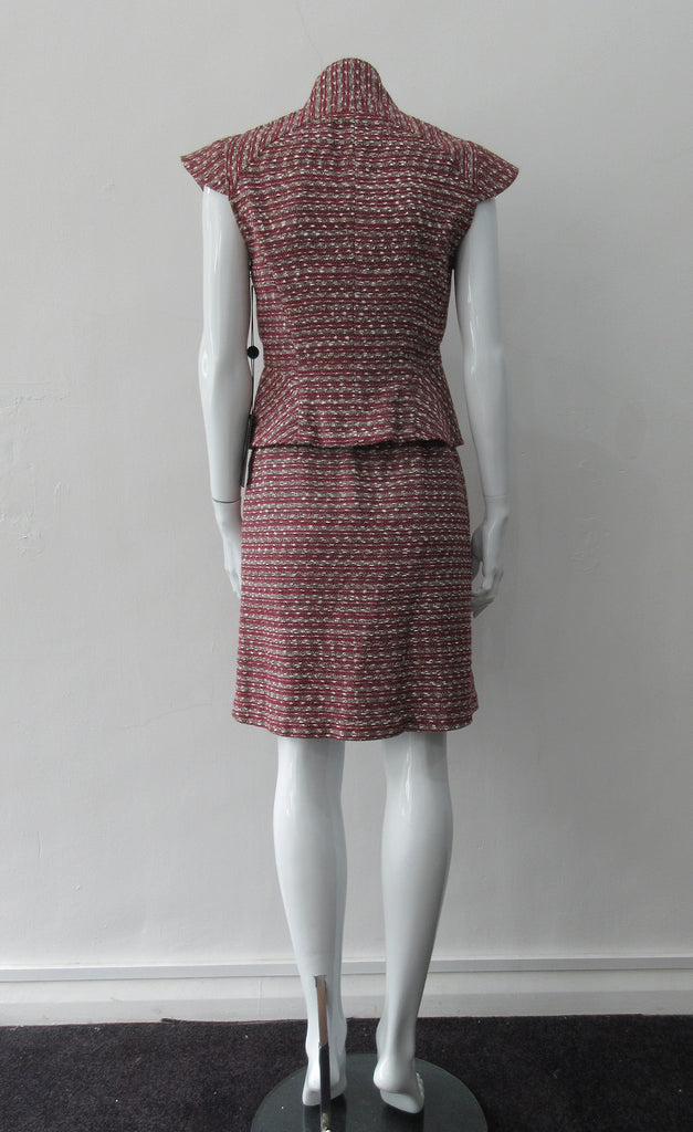 Sleeveless Jacket, Mid-Crop red & grey weave with extended cap at shoulder point for faux sleeve top. Matches with 110701 Yoke Skirt. CB Length 49cm. 450g approximate weight. Size 8. 45% Cotton, 35% Nylon, 15% Polyester, 5% Viscose Lining: 100% Rayon Dry Clean Only. Made in Canada
