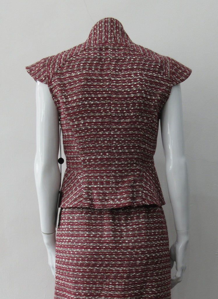 Sleeveless Jacket, Mid-Crop red & grey weave with extended cap at shoulder point for faux sleeve top. Matches with 110701 Yoke Skirt. CB Length 49cm. 450g approximate weight. Size 8. 45% Cotton, 35% Nylon, 15% Polyester, 5% Viscose Lining: 100% Rayon Dry Clean Only. Made in Canada