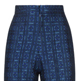 Previously worn sample. High waisted Textured Trouser features blue diamond and square geometric design. 450g approximate weight. 56% Polyester, 36% Acetate, 8% Polyamide. Lining: 100% Rayon. Dry Clean Only. Made in England