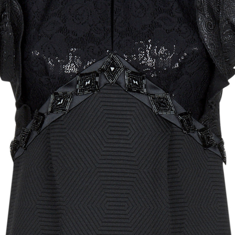 Black Vic Dress midi length a-line dress. Intricate black contrast jacquard fabrics and diamond appliques attached above waist for a couture feel.