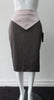 Shiny A Skirt. Chocolate Taupe coloured A-Line skirt with light, soft pink pointed panel on upper part. Stretch woven for greater ease and fit. Invisible side zip. Can be paired with 170609B Dark Spy Top. CB length 67cm. 200g approximate weight. 97% Polyester, 3% Elastine. Lining: 100% Viscose. Made in England