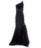 Black sequin and multipanel satin dress with black left thigh gathered tulle with clear bead accent, single strap and conceal zip closure. 62% Viscose, 3% Elastine, 35% Polyethylene. Contrast: 95% Polyester, 5% Spandex. Lining: 100% Viscose. Dry Clean only. Made in England