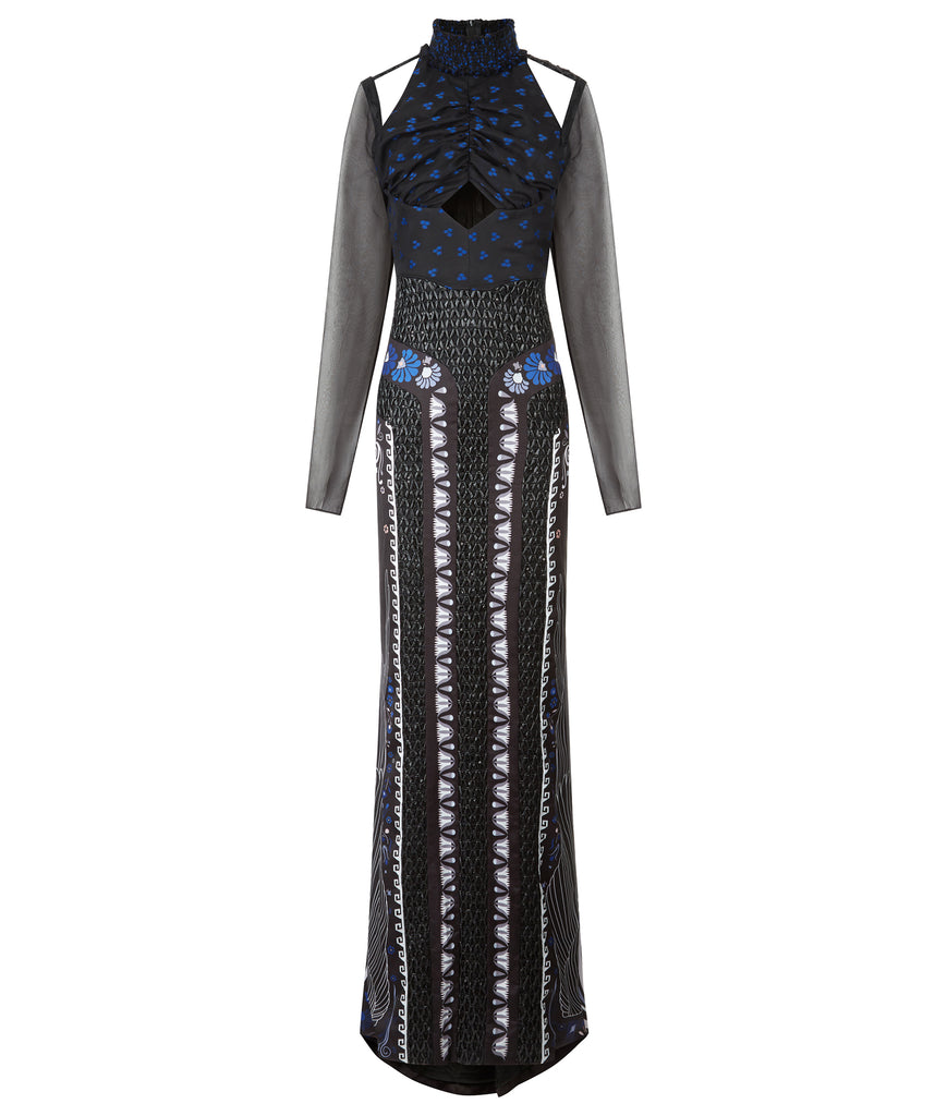 Full length multi-textured print dress featuring faux leather criss-cross paneling and black sheer sleeves. Semi-open top shoulders. Upper bodice has black with blue spotted design.