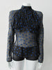 Dark Gathered Top, Generously gathered long sleve top in sheer black with tri-blue dot design. CB zipper and under bust panel trim. 2 invisible side zippers at side seam bottom. Can be paired with 180608D Dark Curve Front Pencil Skirt, CB length 60cm. 50g approximate weight 48% Polyester, 34% Cotton, 18% Nylon. Dry Clean Only. Made in England